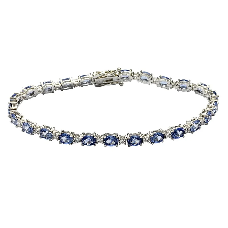 luxury diamond bangles -Suzy Levian Sterling Silver Oval-Cut Blue Sapphire Tennis Bracelet