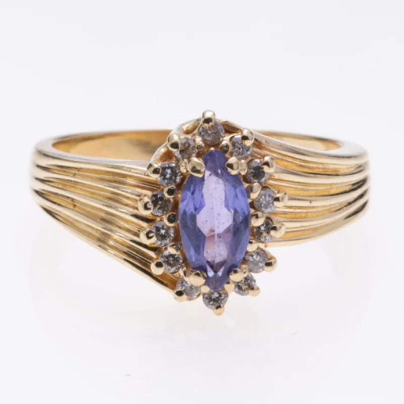 modern rings for women -14K Yellow Gold Tanzanite and Diamond Ring | 0.47ct, 0.14ctw | SZ 6.5