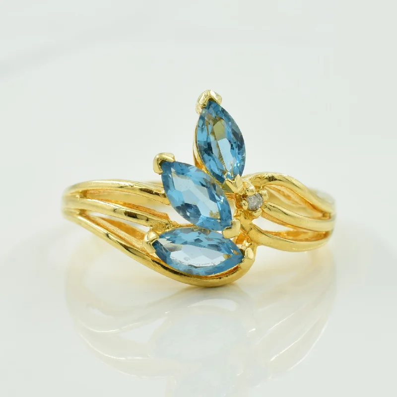 floral rings for women -Blue Topaz & Diamond Bypass Ring | 0.75ctw, 0.01ct | SZ 6.5 |